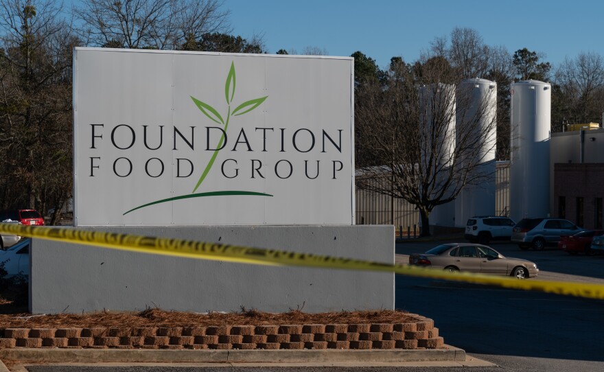 Tanks of liquid nitrogen are seen at the Foundation Food Group poultry processing plant in Gainesville, Ga. Six workers died after a freezer malfunctioned in January 2021.