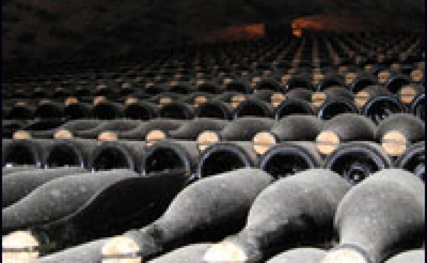 Rows of cava bottles are stacked almost to the ceiling in the vaults of the Gramona cellar.