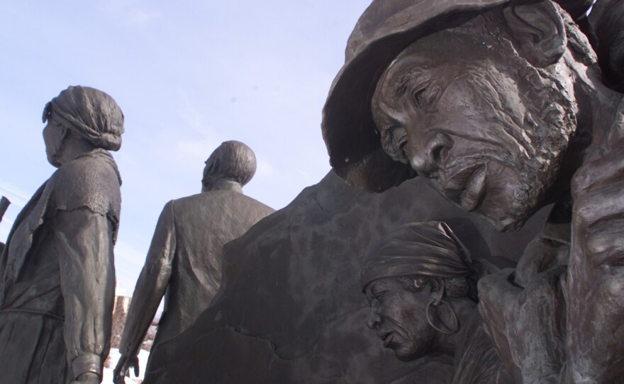 One of Ed Dwight's sculptures in Battle Creek, Mich., depicts escaped slaves along the Underground Railroad being led to freedom by Harriet Tubman and local abolitionist Erastus Hussey.