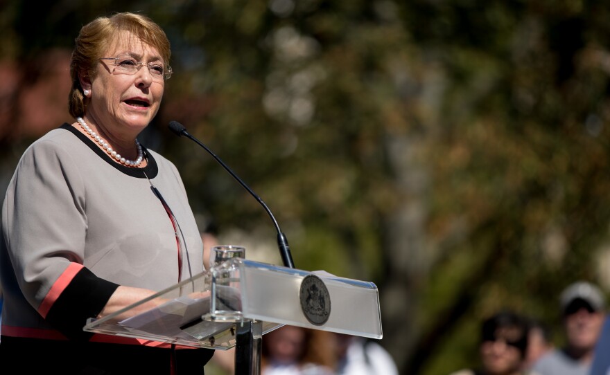 Chile's President Michelle Bachelet speaks during a visit to Washington on Sept. 23. Bachelet favors easing a law which has banned all abortions in Chile since 1990. But social conservatives in the South American nation oppose changes to the current law.