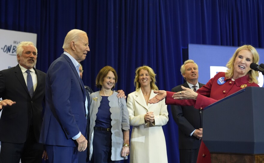 Kerry Kennedy, right, introduces President Biden at a campaign event on April 18 in Philadelphia where she and members of her family endorsed the president's reelection bid.