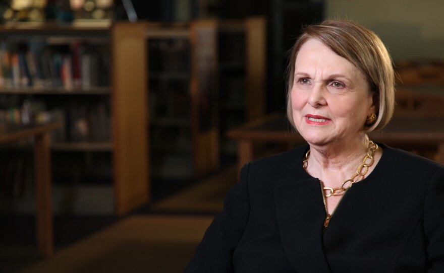 Dr. Rita Bishop, superintendent of Roanoke City Schools, being interviewed in the library of Roanoke Catholic School.