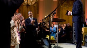Paul McCartney upon receipt of the Library of Congress Gershwin Prize for Popular Song, as President Barack Obama, First Lady Michelle Obama, Malia Obama, Sasha Obama and Marian Robinson attend the concert honoring McCartney in the East Room of the White House. June 2, 2010.