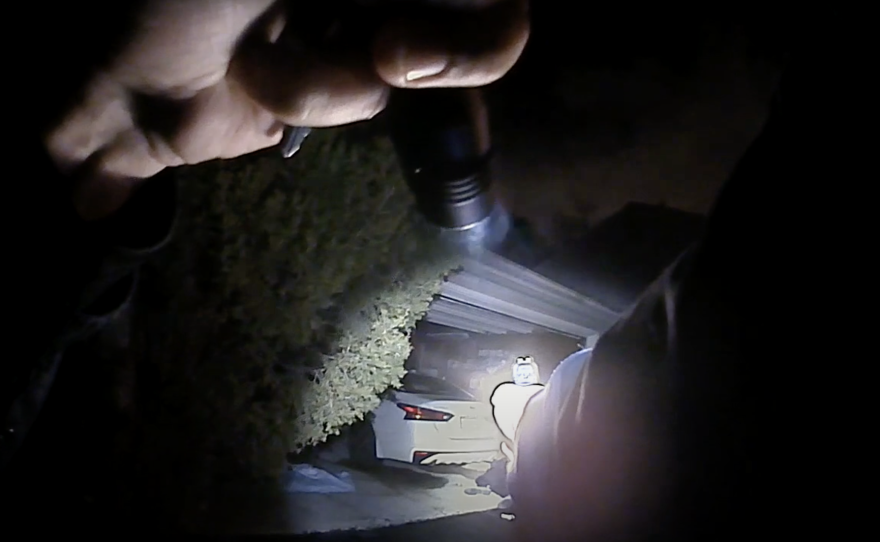 This image from a Columbus police body camera shows the moments before Officer Adam Coy fatally shoots Andre Maurice Hill early Tuesday.