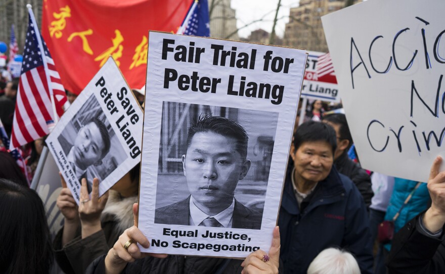 In this Feb. 20 photo, protesters attend a rally in Brooklyn, New York, in support of former NYPD police officer Peter Liang, who was convicted of manslaughter for the 2014 shooting death of Akai Gurley.