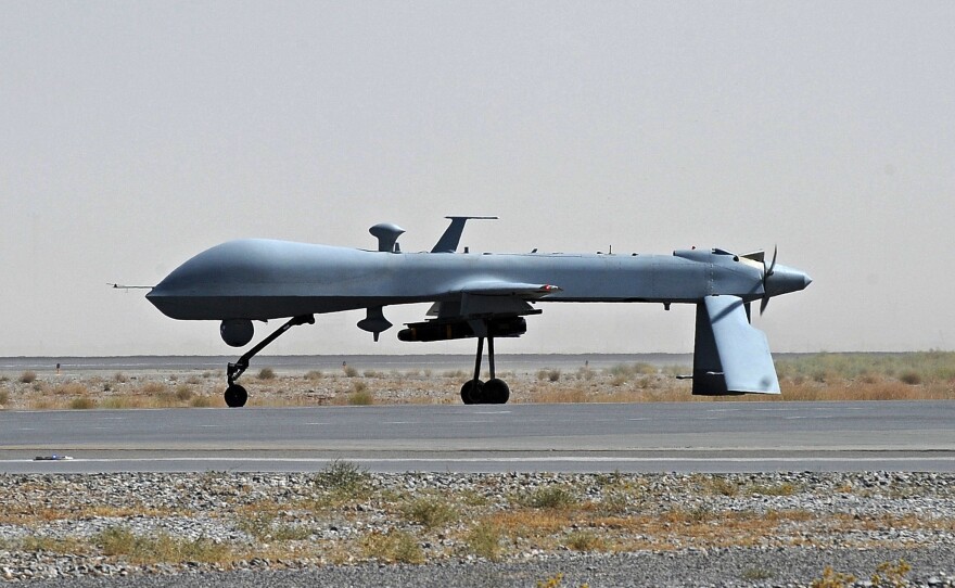 A U.S. Predator drone on the tarmac at the Kandahar military airport in southern Afghanistan in 2010. The U.S. has been using drones more and more frequently since the Sept. 11 attacks. They have been highly effective on the battlefield, but have raised legal and ethical issues.