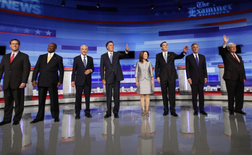 Republican presidential candidates participated in the Iowa GOP/Fox News Debate at the CY Stephens Auditorium in Ames, Iowa, Thursday. From left, former Sen. Rick Santorum (R-PA); businessman Herman Cain; Rep. Ron Paul (R-TX), former Massachusetts Gov. Mitt Romney; Rep. Michele Bachmann (R-MN); former Minnesota Gov. Tim Pawlenty; former Utah Gov. Jon Huntsman; former House Speaker Newt Gingrich.
