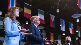 President Donald Trump closes his eyes as he accepts blessings as he attends church at International Church of Las Vegas, Sunday, Oct. 18, 2020, in Las Vegas, Nev. 
