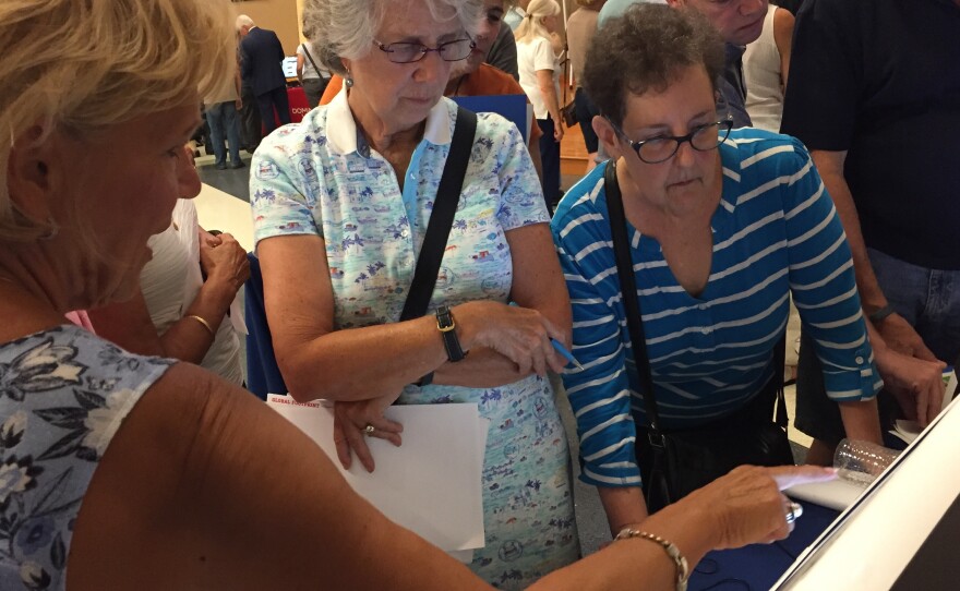 Attendees in Bucks County, Pa. test-drove new voting machines at an event aimed at helping the county decide which equipment to buy. Security is a major focus in the 2020 presidential race.