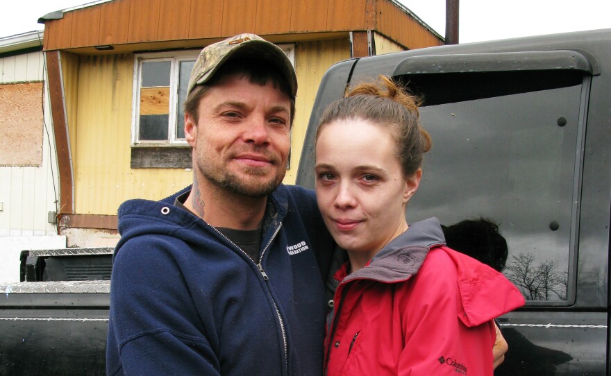 Frank and Amber Adams of Hammondsport, N.Y. He sometimes has to redeem empty soda cans to buy gas to take Amber to counseling classes.