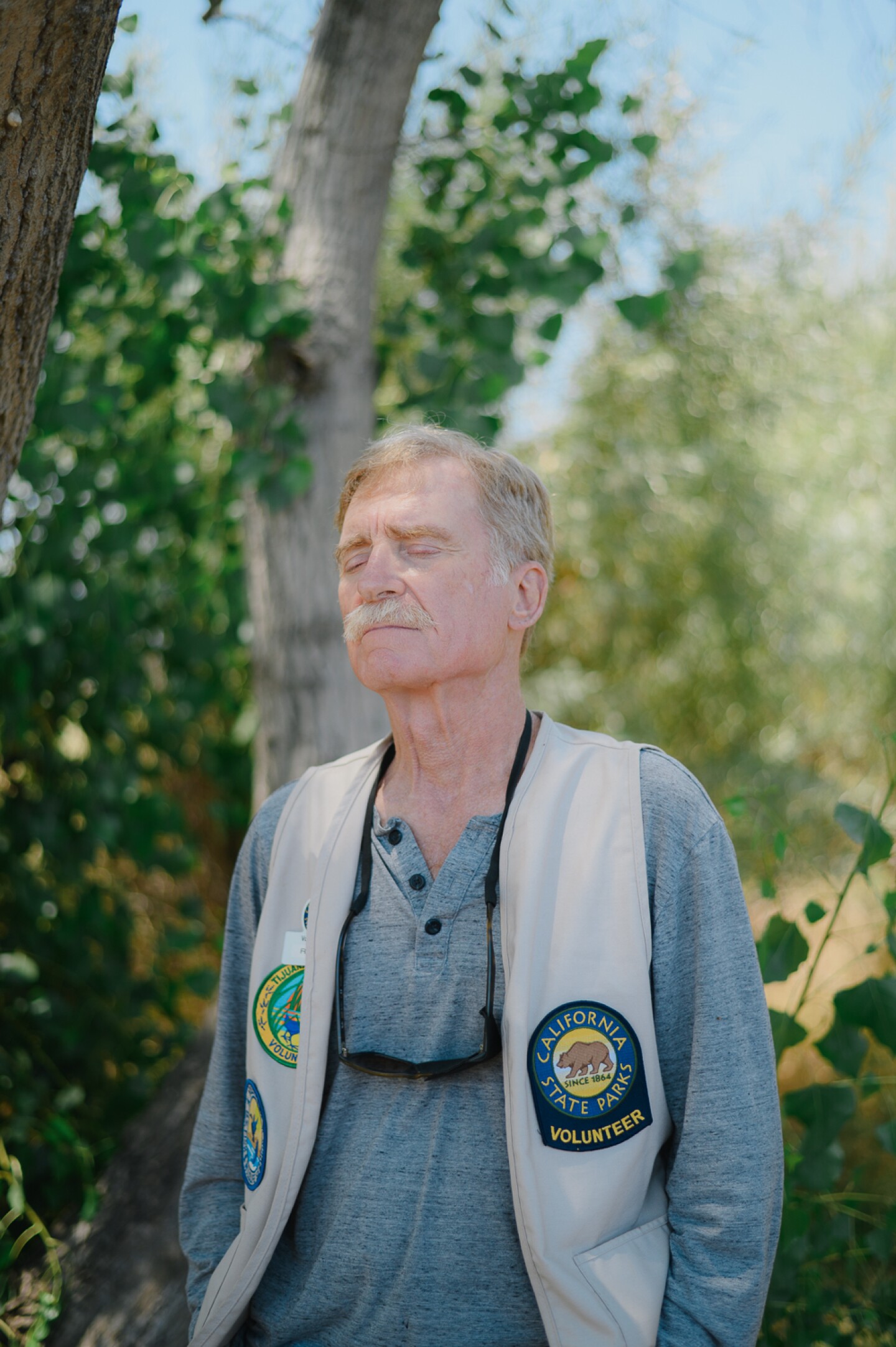 Volunteer docent Ron Peterson stands for a portrait at the Tijuana River Estuary in Imperial Beach, California on August 3, 2024.