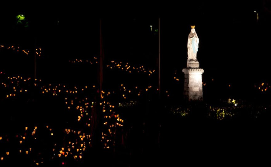 The silent procession to the Grotto during the International Military Pilgrimage to Lourdes, France.