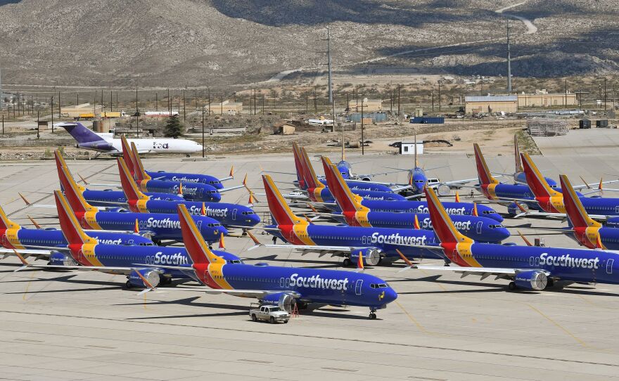 Southwest Airlines Boeing 737 Max aircraft are parked on the tarmac after being grounded, at the Southern California Logistics Airport in Victorville, Calif., in March.
