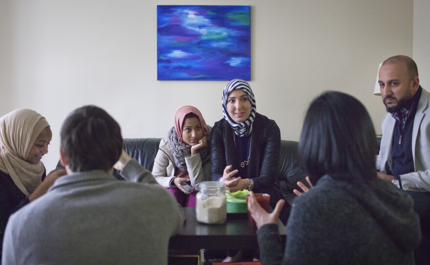 A group of young Muslim friends in Washington, D.C., meets occasionally to support each other in their work and discuss the struggles their community faces.