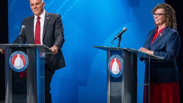 Candidates Phil Lyman and Rep. Celeste Maloy smile at the end of the 3rd Congressional District GOP primary debate in Salt Lake City, Utah, on June 1.