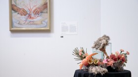 A floral designer interprets Diego Rivera's "The Hands of Dr. Moore" at the April 2019 Art Alive at San Diego Museum of Art, 
