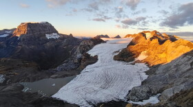 A Swiss glacier shows the effects of years of ice loss, with exposed rock replacing ice that once covered the landscape.