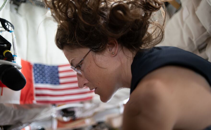 April 4: Astronaut Christina Koch preps for lunar flyby activities after completing aerobic exercise on the flywheel device.