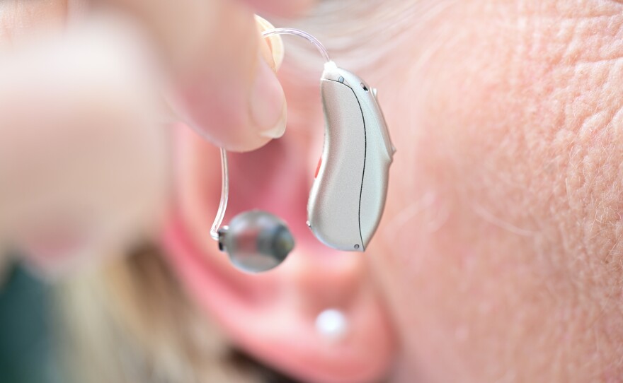 People who consistently wear hearing aids have a lower chance of falling, a new study finds.