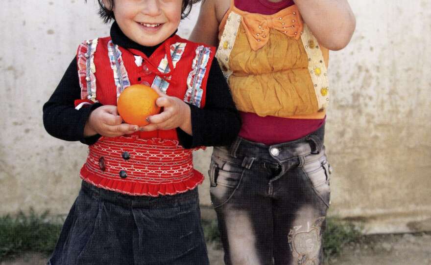 Two little girls photographed at the Syrian refugee camp in Lebanon's Bekaa Valley two years ago. Massaad says most of the families there when she visited were from Homs and Idlib, Syria.