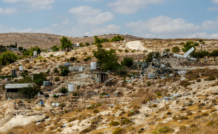 Rubble and the remains of demolished Palestinian homes and agricultural structures lie scattered across a hillside in Masafer Yatta, in the Israeli-occupied West Bank, on Sept. 24, 2026.