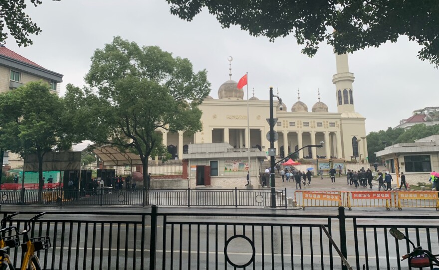 The main mosque in Yiwu, Zhejiang province. Nearby business owners say the local government removed the mosque's arched doorways but ran out of funds to remove the mosque domes.