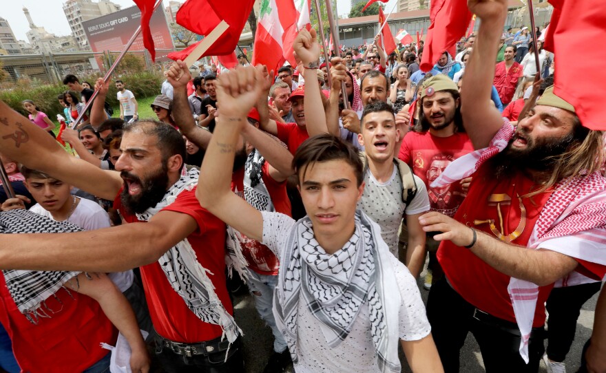 Supporters of the Lebanese Communist Party take part in a May Day rally as they mark International Workers' Day in Beirut.