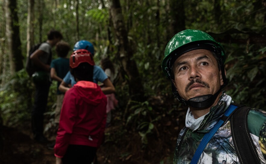 Edinson Castro, an ex-FARC rebel, is now a guide for tourists in the jungle.