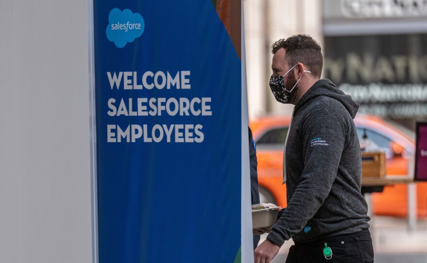 An employee enters the Salesforce office in San Francisco, on Oct. 5. Benioff often acts when he feels policies adversely impact his employees.