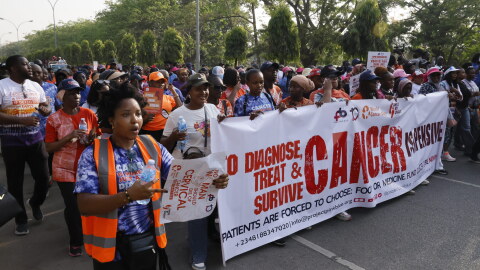 Hundreds of people gather in Abuja, the capital of Nigeria, to mark World Cancer Day on February 7, marching to raise awareness about cancer and the importance of early diagnosis. The World Health Organization cites Nigeria as a country with a rapidly rising number of cancer cases.