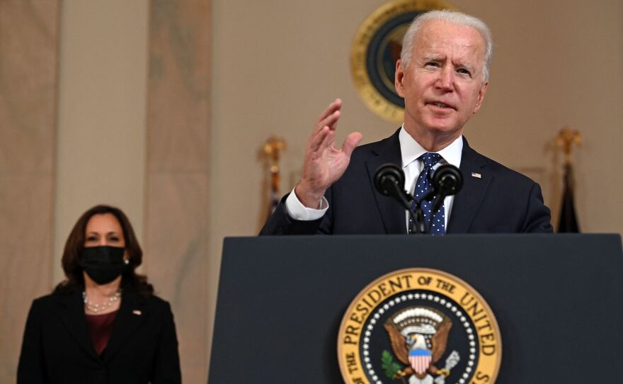 President Biden delivers remarks Tuesday on the guilty verdict against former police officer Derek Chauvin, as Vice President Harris looks on.