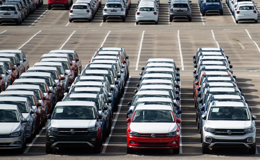 About 5,000 unfinished cars remain parked on May 14 outside the Volkswagen Navarra factory in Pamplona, Spain, due to lack of semiconductor supply. Manufacturers all over the world have been struggling to meet surging demand.