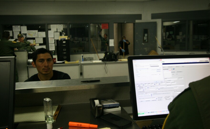 A man from Veracruz awaits processing at the U.S. Border Patrol detention center in Nogales, Ariz.