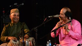 Tabla player and concert organizer Samir Chatterjee plays alongside flutist Ronu Majumdar at Chhandayan's annual all-night concert in New York City in May.