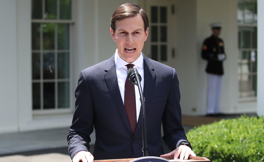 White House senior adviser and Trump son-in-law Jared Kushner reads a statement Monday in front of the West Wing of the White House after meeting behind closed doors with the Senate Intelligence Committee about Russian meddling in the 2016 presidential election.