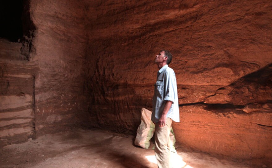 Archeologist Geoff Emberling takes a moment inside a previously undisturbed tomb of an unknown king at El Kurru.