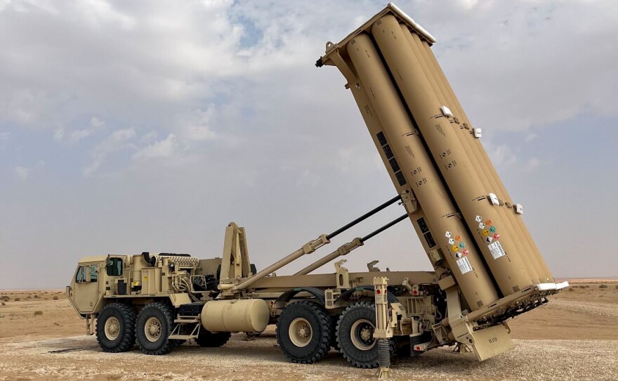 A Terminal High Altitude Area Defense (THAAD) launcher emplaced and prepared to launch interceptors to counter ballistic missile threats at an undisclosed location in CENTCOM area of responsibility in November 2023.