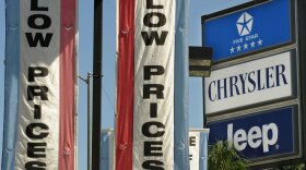 Auto dealers present themselves as part of Main Street with no ties to the high finances of Wall Street, but that image is more nostalgia than reality.