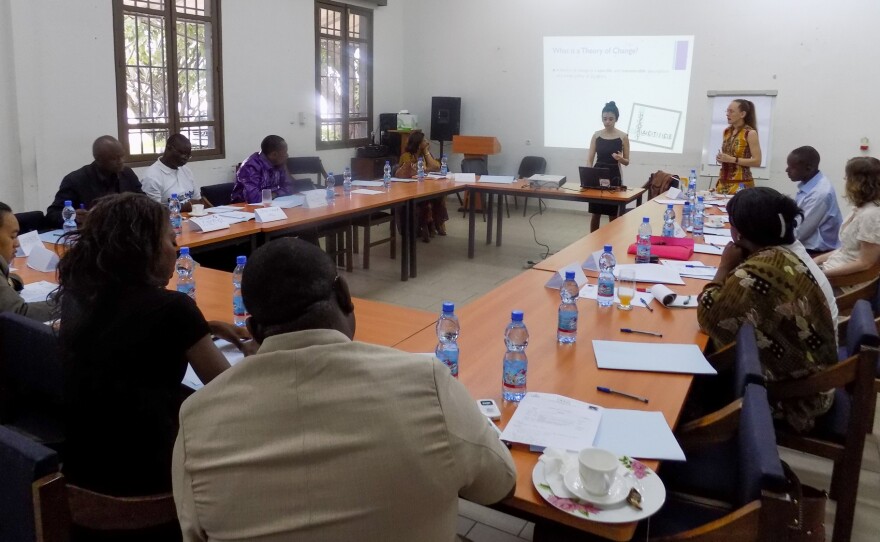 Carly Tubbs attends a meeting about the "Healing Classrooms" project for kids at risk in the Democratic Republic of Congo.