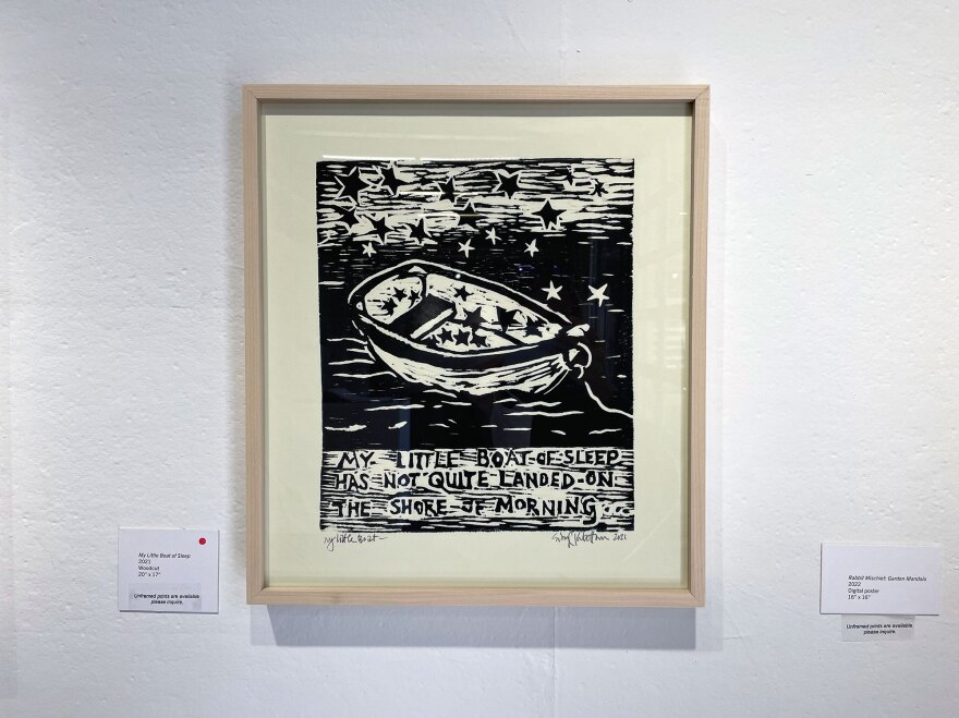 "My Little Boat of Sleep" by Sibyl Rubottom is shown installed at the Athenaeum Art Center on Dec. 19, 2022. The work is a 2021 woodcut print, inspired by words spoken one early morning to her energetic grandson: "My little boat of sleep has not quite landed on the shore of morning..."