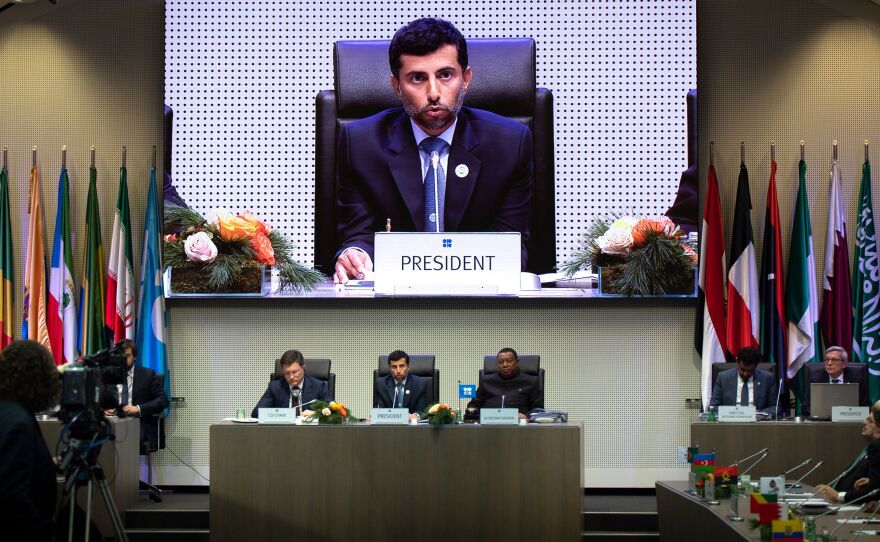 OPEC President Suhail al-Mazrouei speaks Friday at OPEC headquarters in Vienna. OPEC, Russia and other producers have agreed to cut production, ignoring pressure from President Trump.