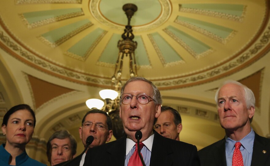 Senate Majority Leader Mitch McConnell says he won't let the chamber vote on Loretta Lynch — the nominee to become the next attorney general — until the Senate passes its human trafficking bill.