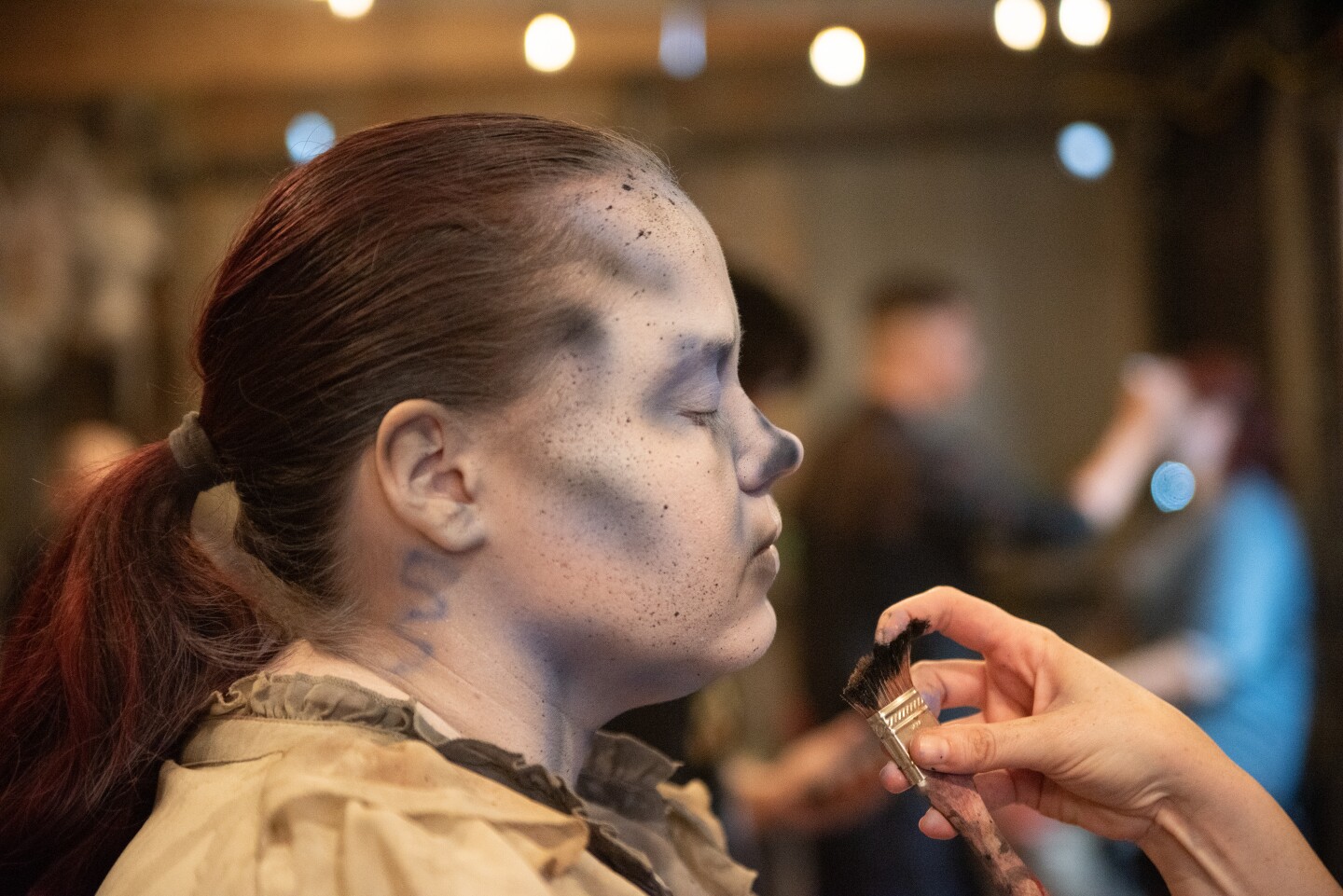 Luca Dismukes getting undead for her shift in the graveyard at The Haunted Trail. Sept. 25, 2025.