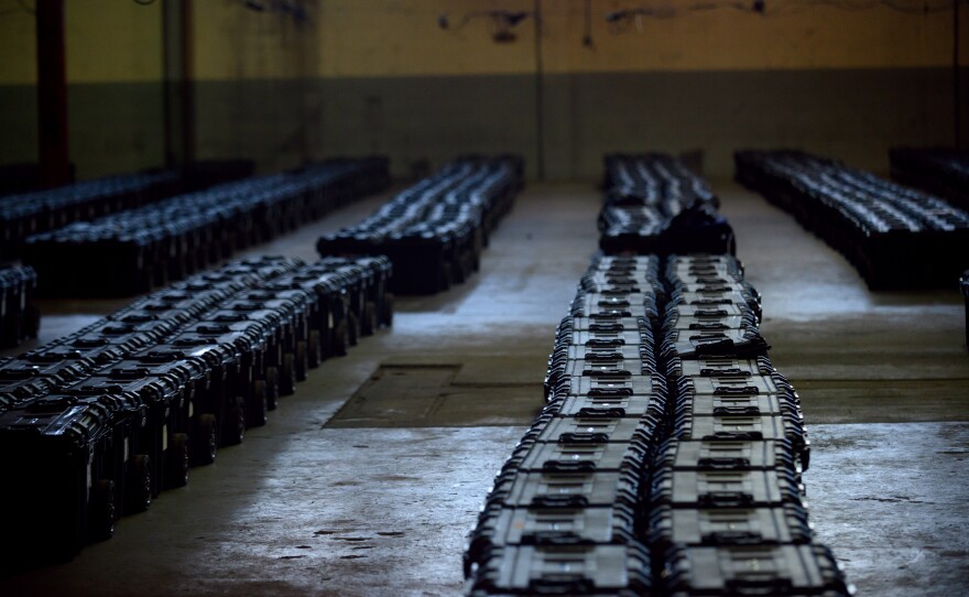 Election precinct cases containing ballots, election materials and keys to voting machines are held under guard by the Allegheny County Police at the Allegheny County elections warehouse on Nov. 4 in Pittsburgh.