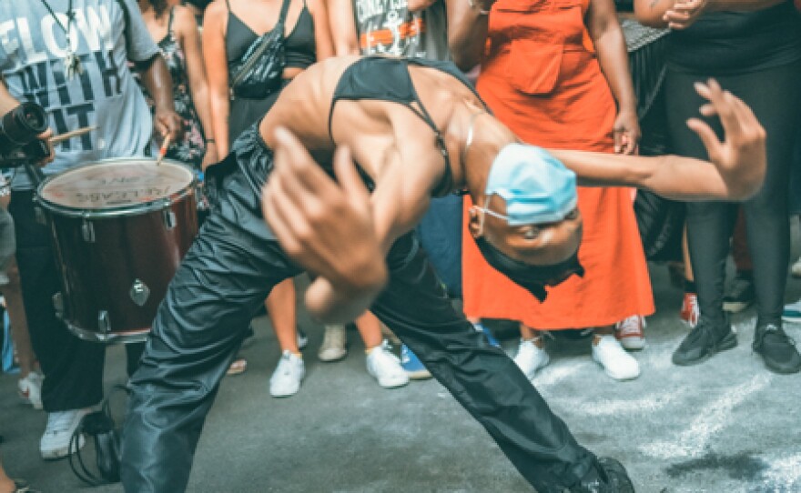 Neighbors dancing at a Saint James Joy block party in August of 2020.