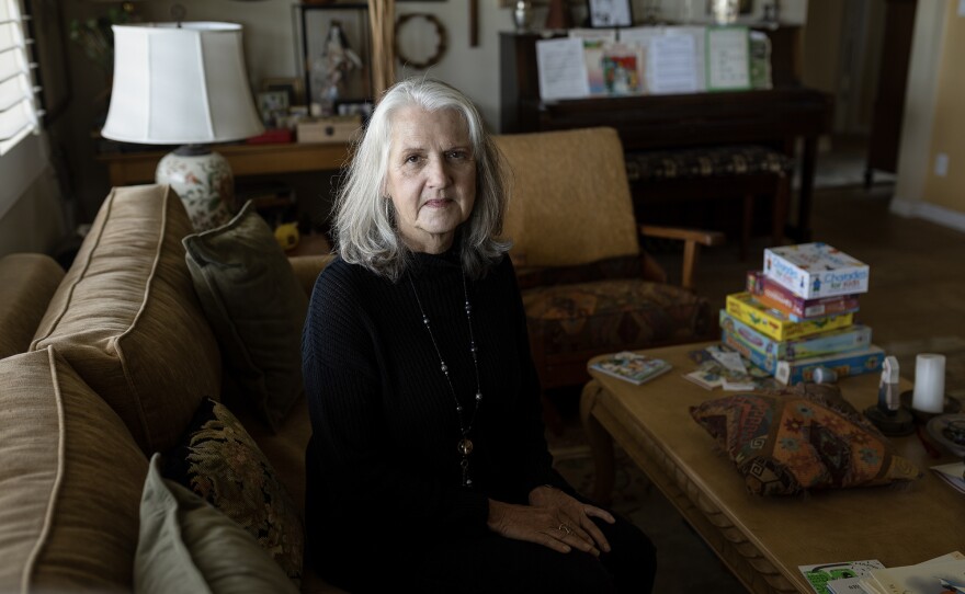 Patricia Baca inside her home in Vista on March 31, 2023. Baca, who adopted her late son’s children, has unsuccessfully tried to get their benefits returned. 