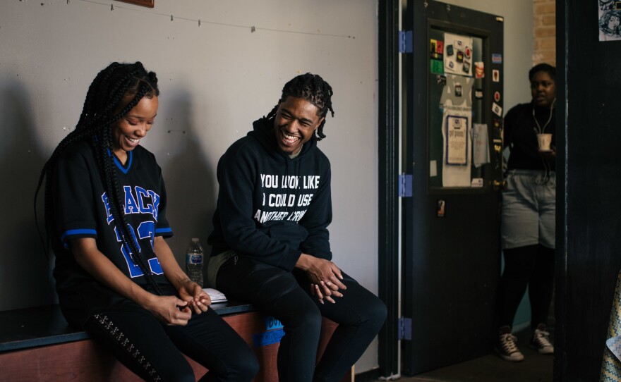 Jamila Woods talks with Amar Taylor, a site manager for the Check the Method workshop, at Young Chicago Authors.
