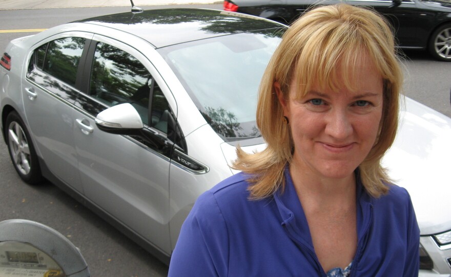 Sara Busch of Havertown, Pa., owns a Chevy Volt, an electric hybrid. Like a lot of Americans, she's buying less gasoline than she used to, which means she's paying less in gas taxes.