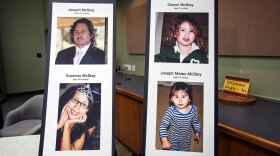 This photo display at a November 2013 press conference shows Joseph and Summer McStay, and their children Gianni and Joseph Mateo.