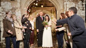 Wedded bliss. Doc and Louisa are married and the villagers throw confetti in celebration.